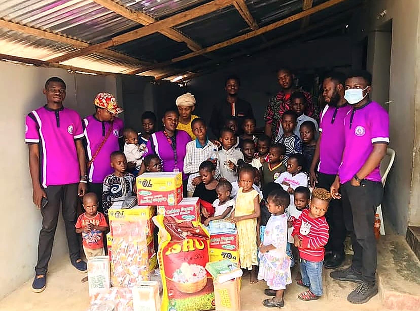 CUP of Cold Water Foundation volunteers distributing food and supplies to families
